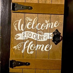 Wooden wall decor with metal hardware